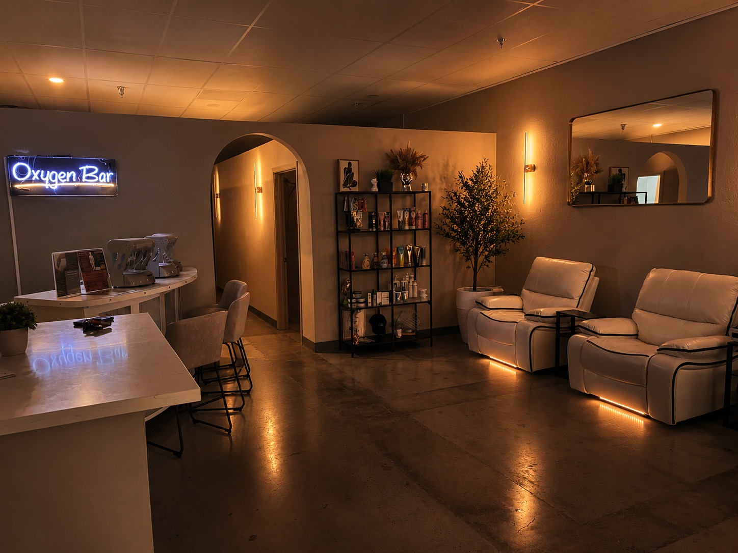 The Oxygen Bar lounge at Citrus & Sage Wellness Retreat, with neon signage and reclining chairs