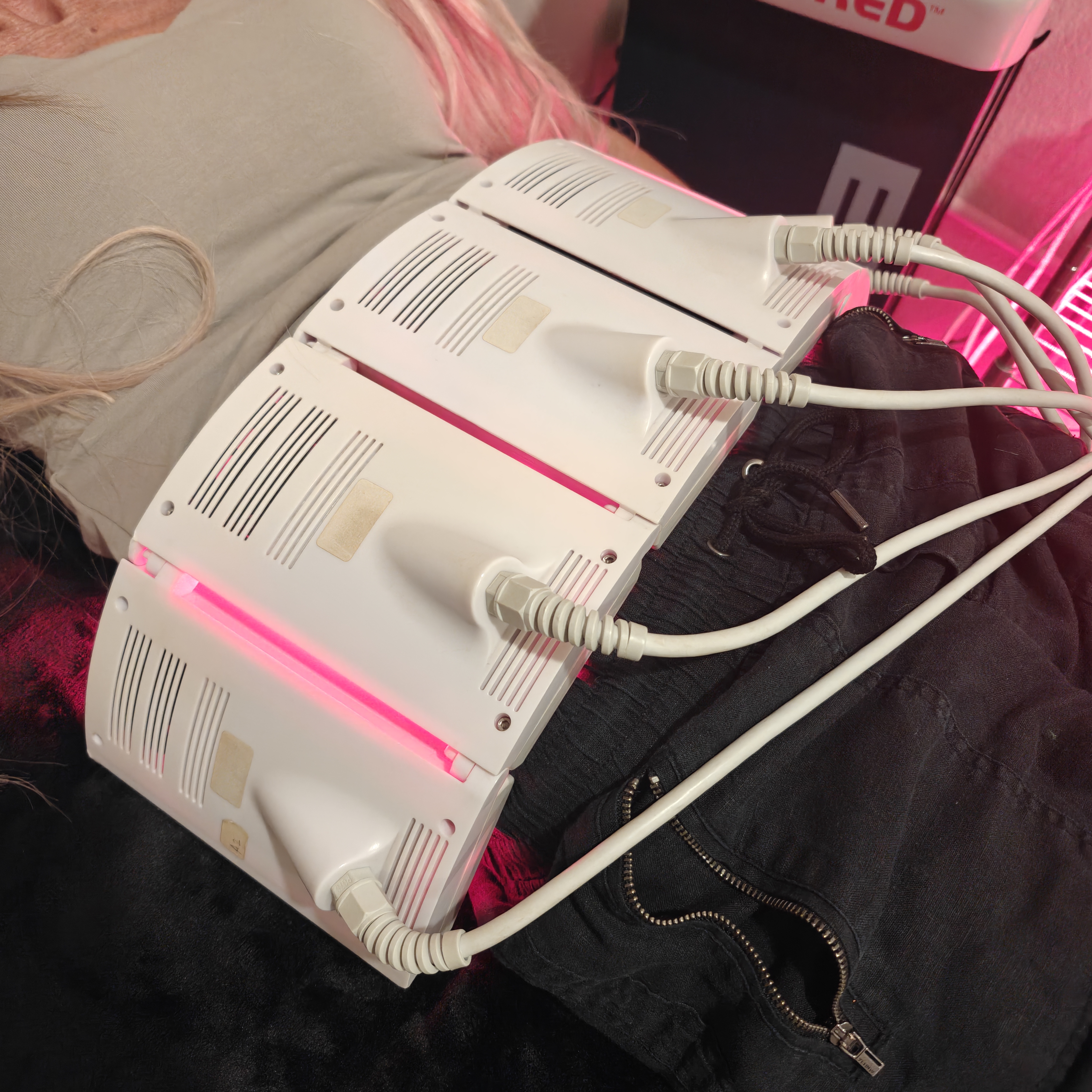 InvisaRed treatment pads in use at Citrus & Sage Wellness